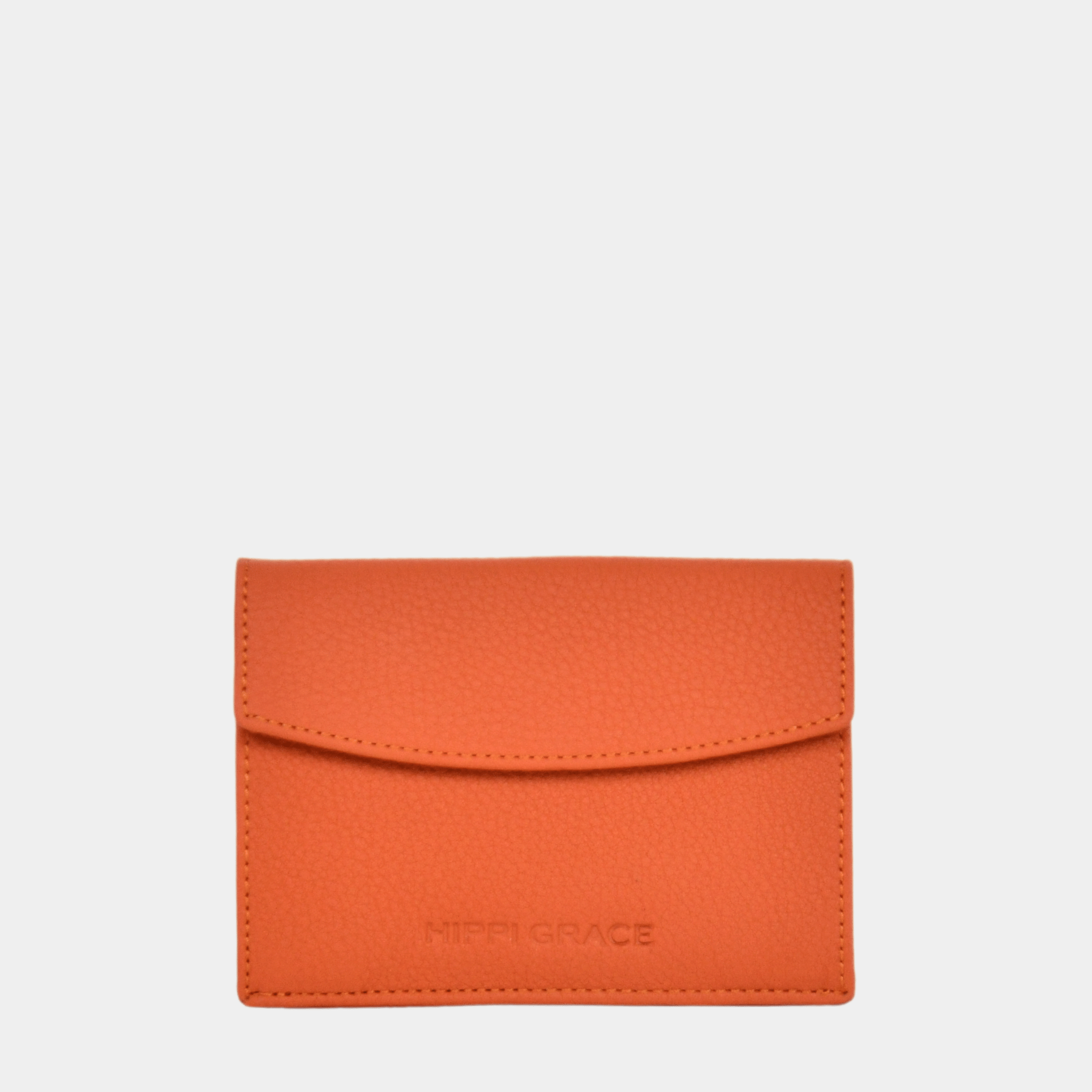 Kort-lommebok, Klassisk Ku-skinn, Magnet-lukning. Hippi Grace Lommebok Unisex til kort i Superior Orange, laget av ekte skinn. Norsk Design. Lommebok i ekte skinn med glidelås lukking i topp.