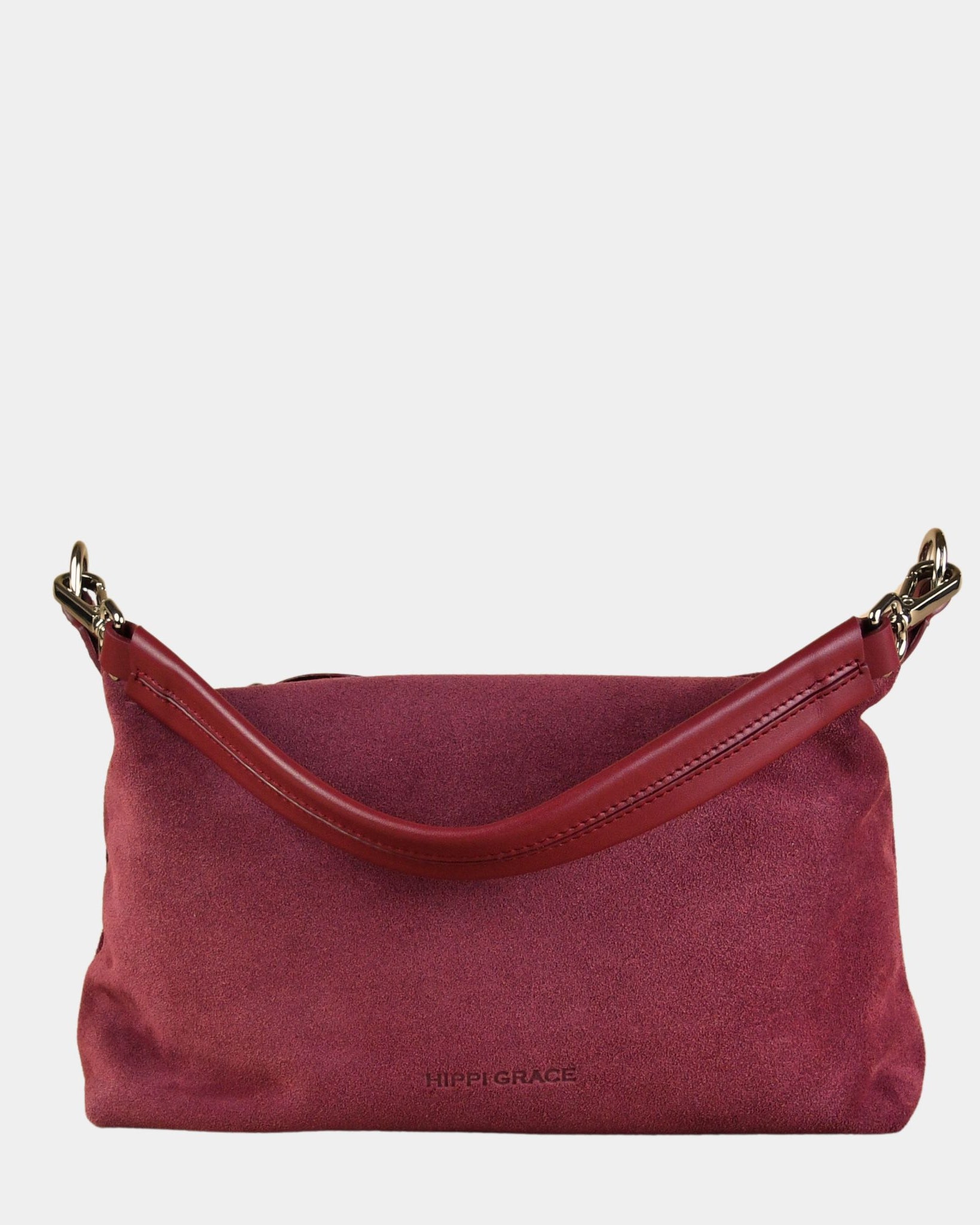 Crossbody småveske i eksklusivt ku skinn. Hippi Grace Lucca i fargen semsket merlot rød er en liten skinnveske til dame. Vesken har et minimalistisk og tidløst design, og har et praktisk interiør med glidelås lukking i topp. Skinnvesken kommer med en skulderstropp og en regulerbar crossbody stropp, begge avtagbare. Norsk Design. rødlig skinnveske dame. Rød Veske dame. Hverdagsveske. Festveske. Ekte skinn. Bærekraftig. Skulderveske dame. Crossbody veske dame. Crossbodyveske. Små veske. Mindre veske.