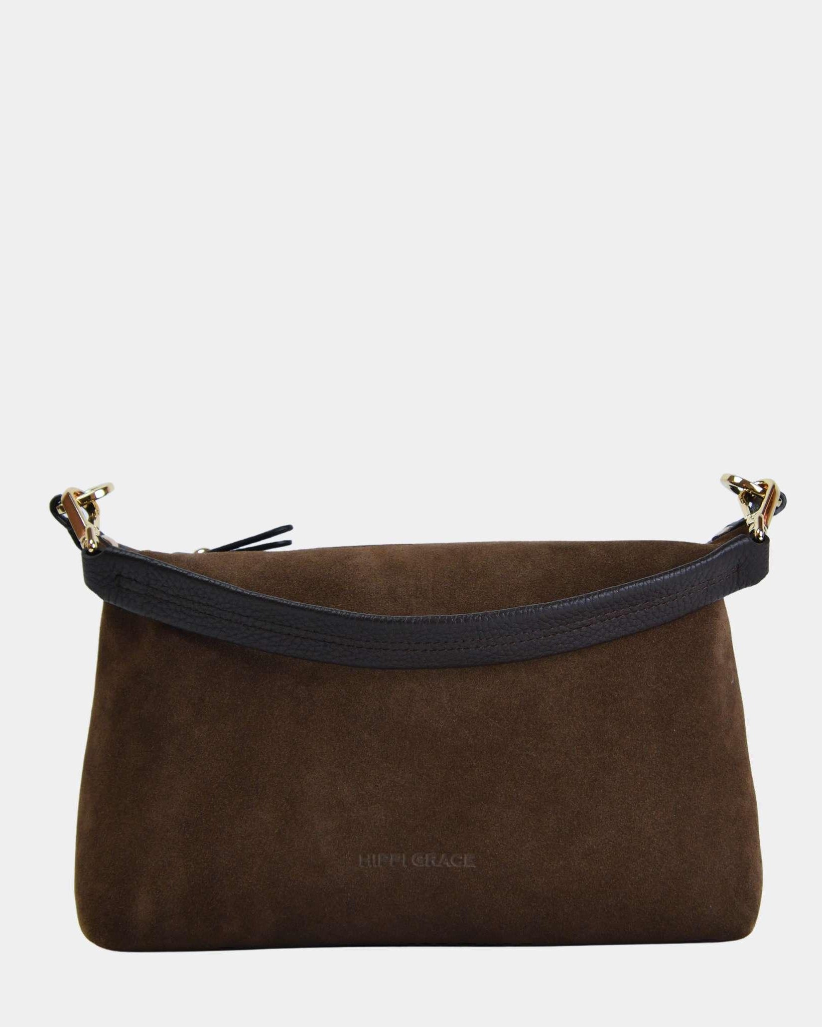 Lucca i semsket brunt skinn med gull-detaljer. Følger med lang crossbodystropp. En lett dameveske som passer perfekt til hverdag og fest. Klassisk og stilrent norsk design.