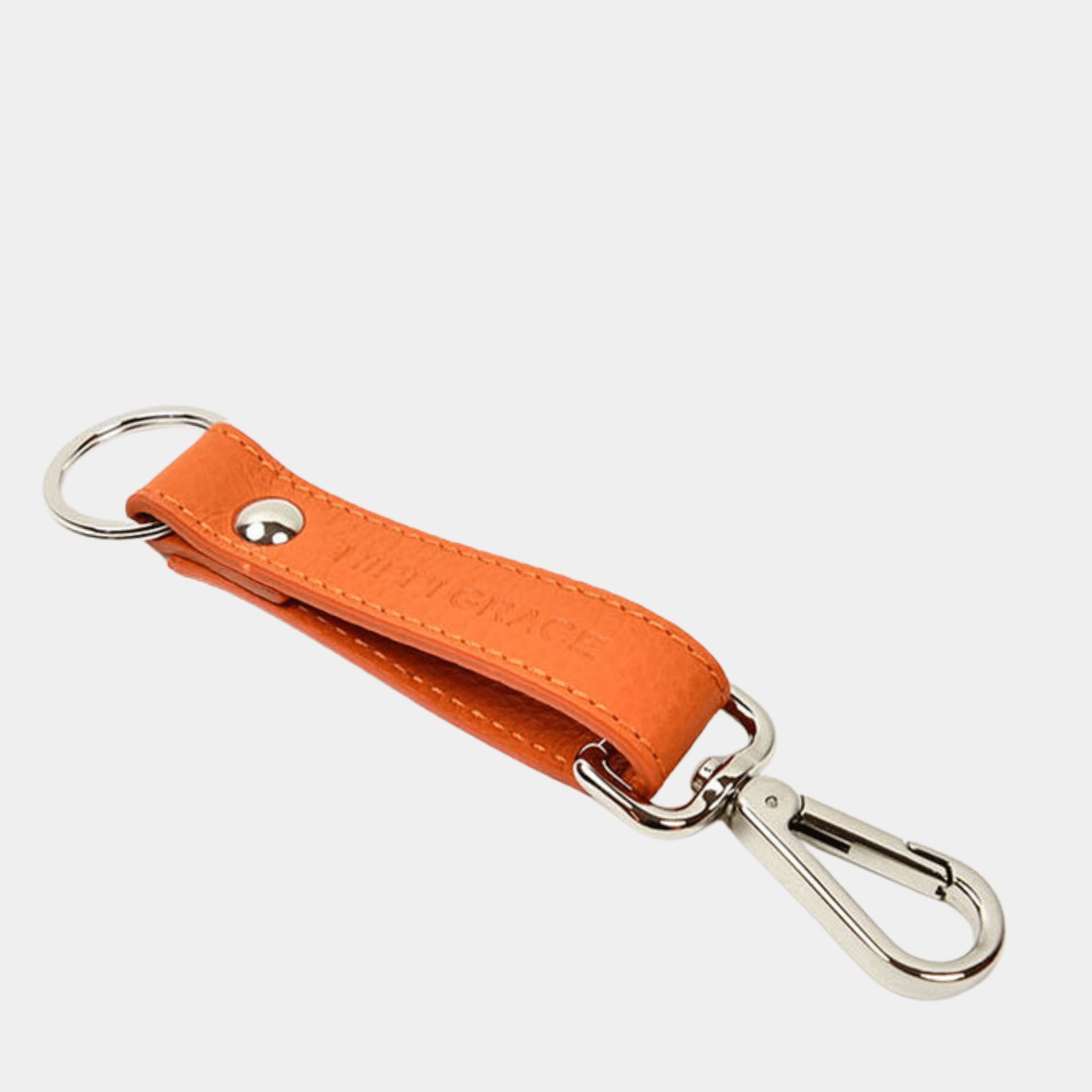 nøkkelring i klassisk ku-skinn. Hippi Grace Nøkkelring i fargen Superior Orange er laget av ekte skinn. Tilbehør. Norsk Design.