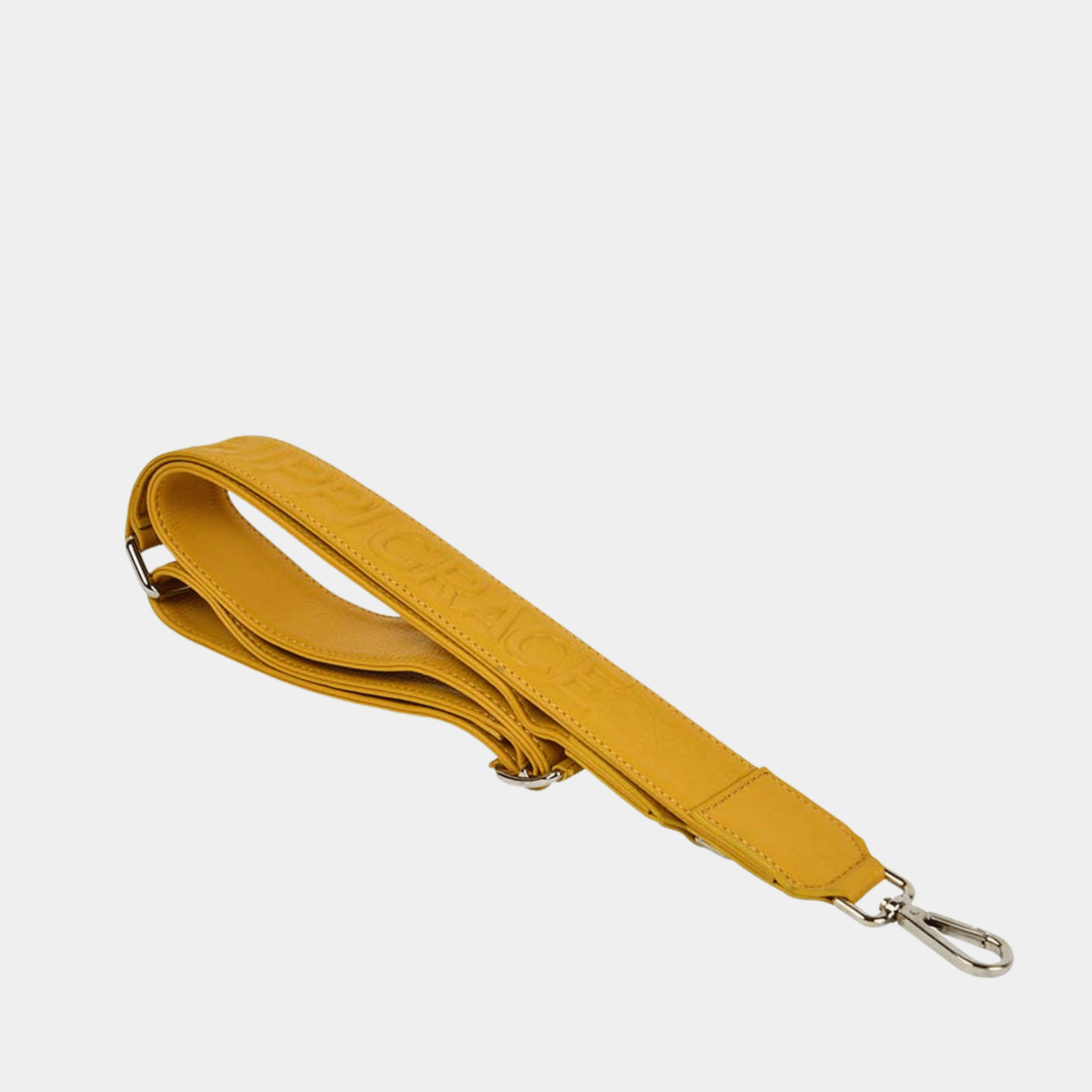 Bred skulderstropp i klassisk Ku-skinn, Crossbody lengde, Preget Logo, sølv detaljer. Hippi Grace Preget Regulerbar Stropp i Bohem Bumblebee. Ekte skinn. Gul Skinnstropp til veske i ekte skinn. Norsk Design.