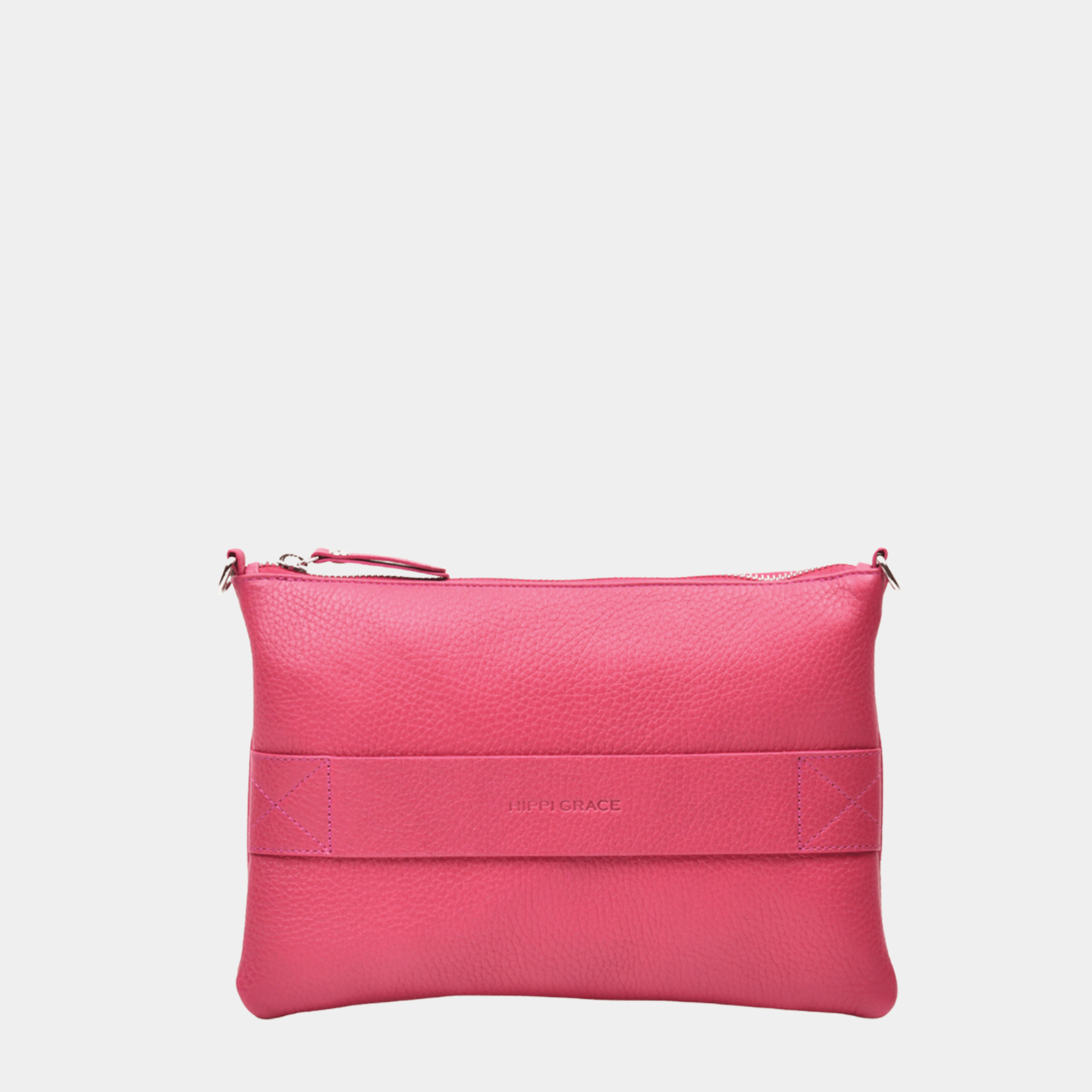 Liten veske i klassisk Ku-skinn med glidelås-lukning, lang skulderstropp og håndleddsstropp. Skinn veske. veske dame. bag. norsk design. 3IN1 veske fra hippi grace i rosa. Rosa veske til dame. Sommerveske. Rosa tilbehør til dame. Hippi Grace 3in1 i fargen mørk rosa. Mørk rosa veske til dame. Clutch til dame i mørk rosa fra Hippi grace. Rosa clutch til dame i ekte skinn.