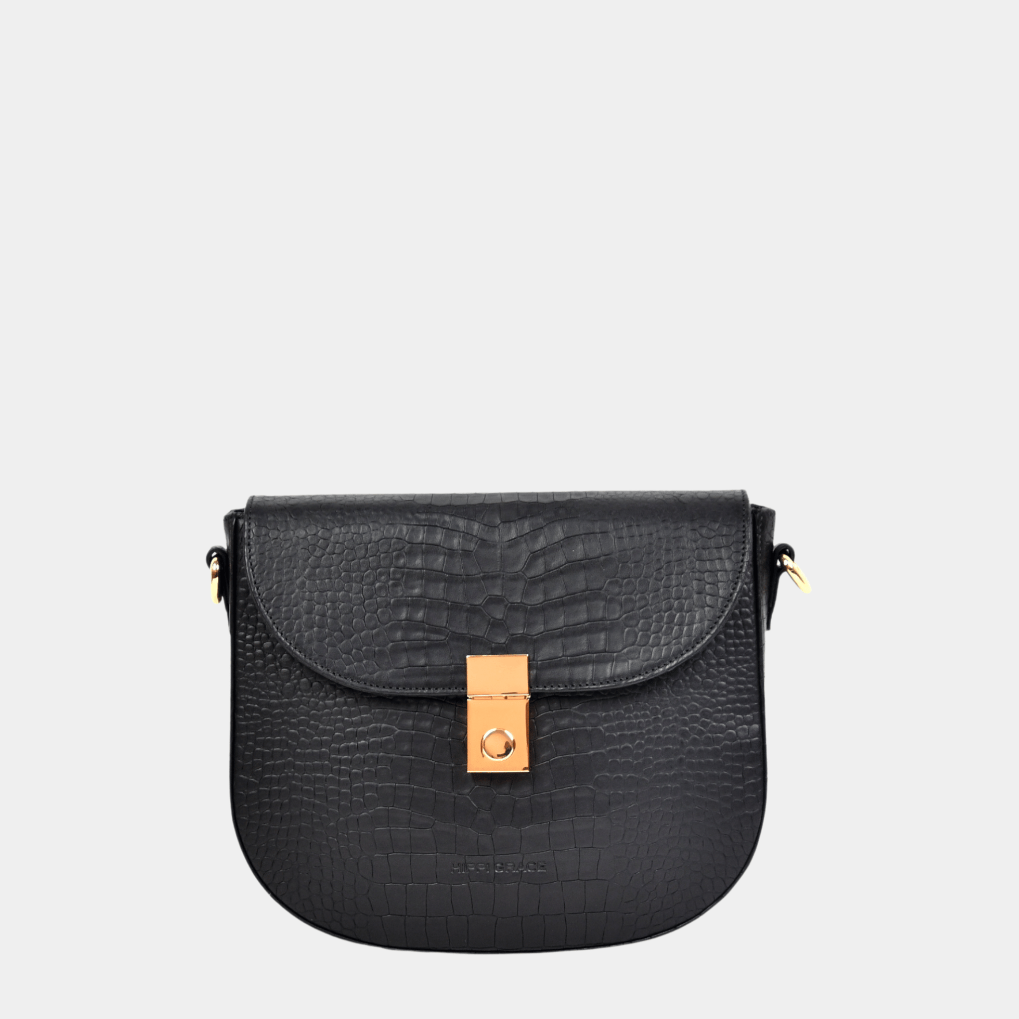Liten veske i Ku-skinn, crossbody skulderstropp, klikk-lås i gulldetaljer. 