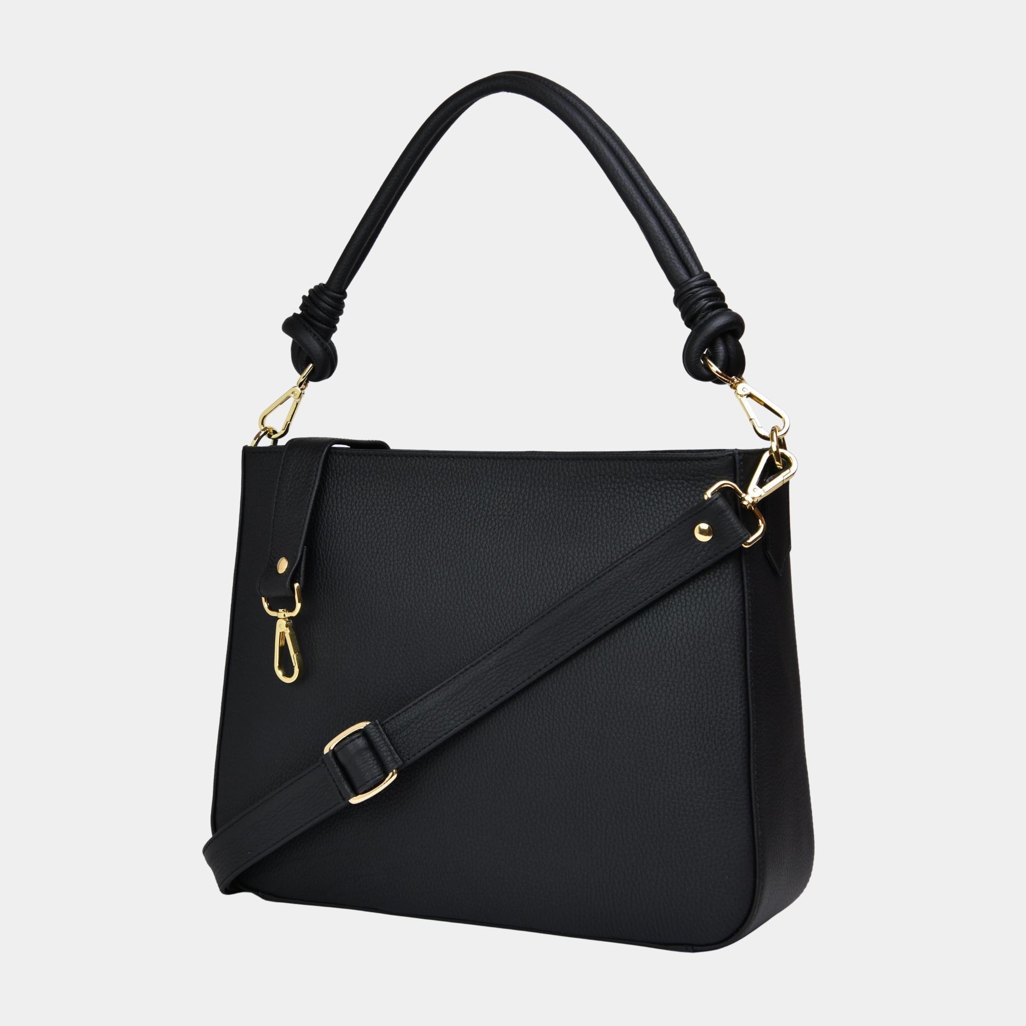 Hampton vesken sett bak fra, vesken inkluderer både kort og lang stropp. [wv]