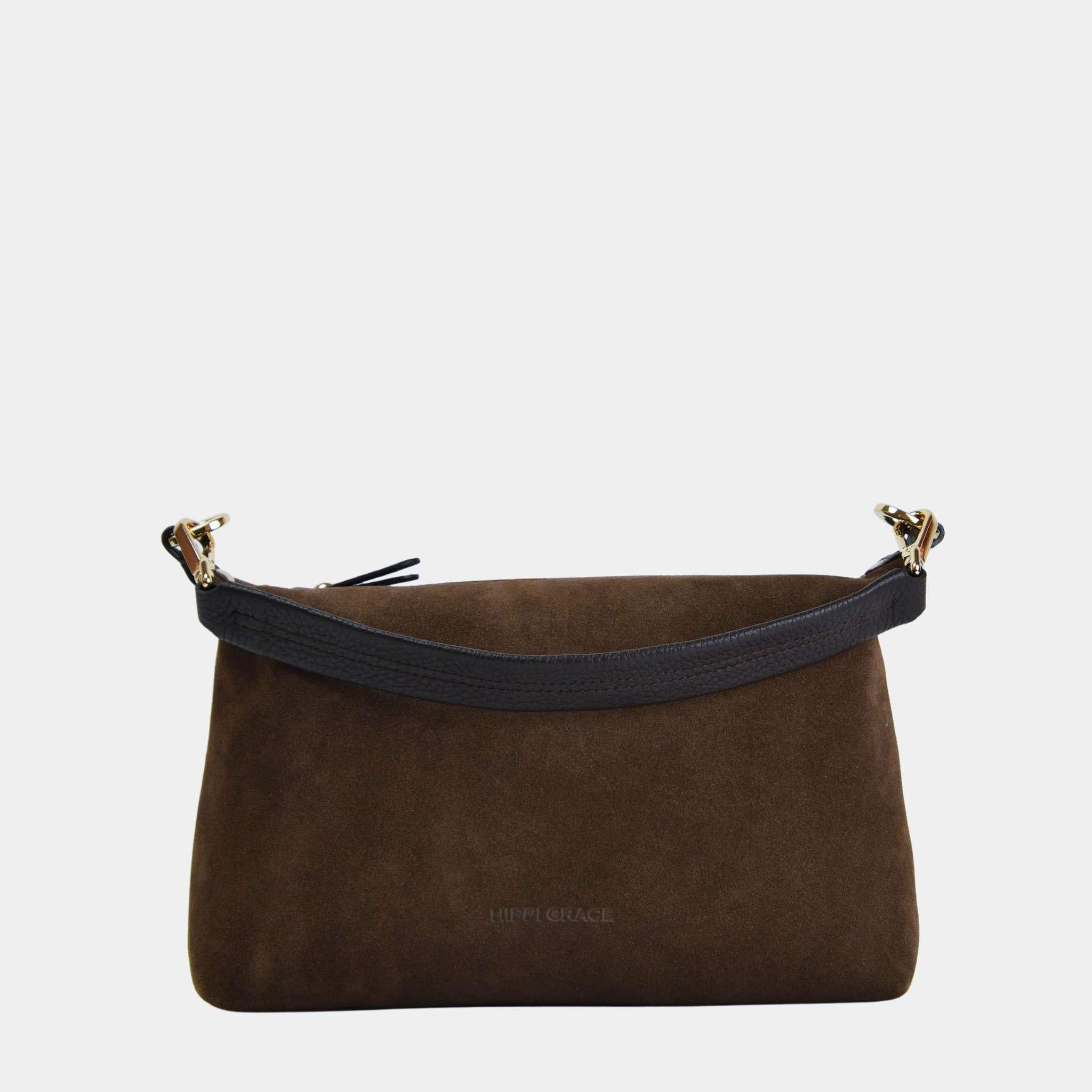 Lucca i semsket brunt skinn med gull-detaljer. Følger med lang crossbodystropp. En lett dameveske som passer perfekt til hverdag og fest. Klassisk og stilrent norsk design.