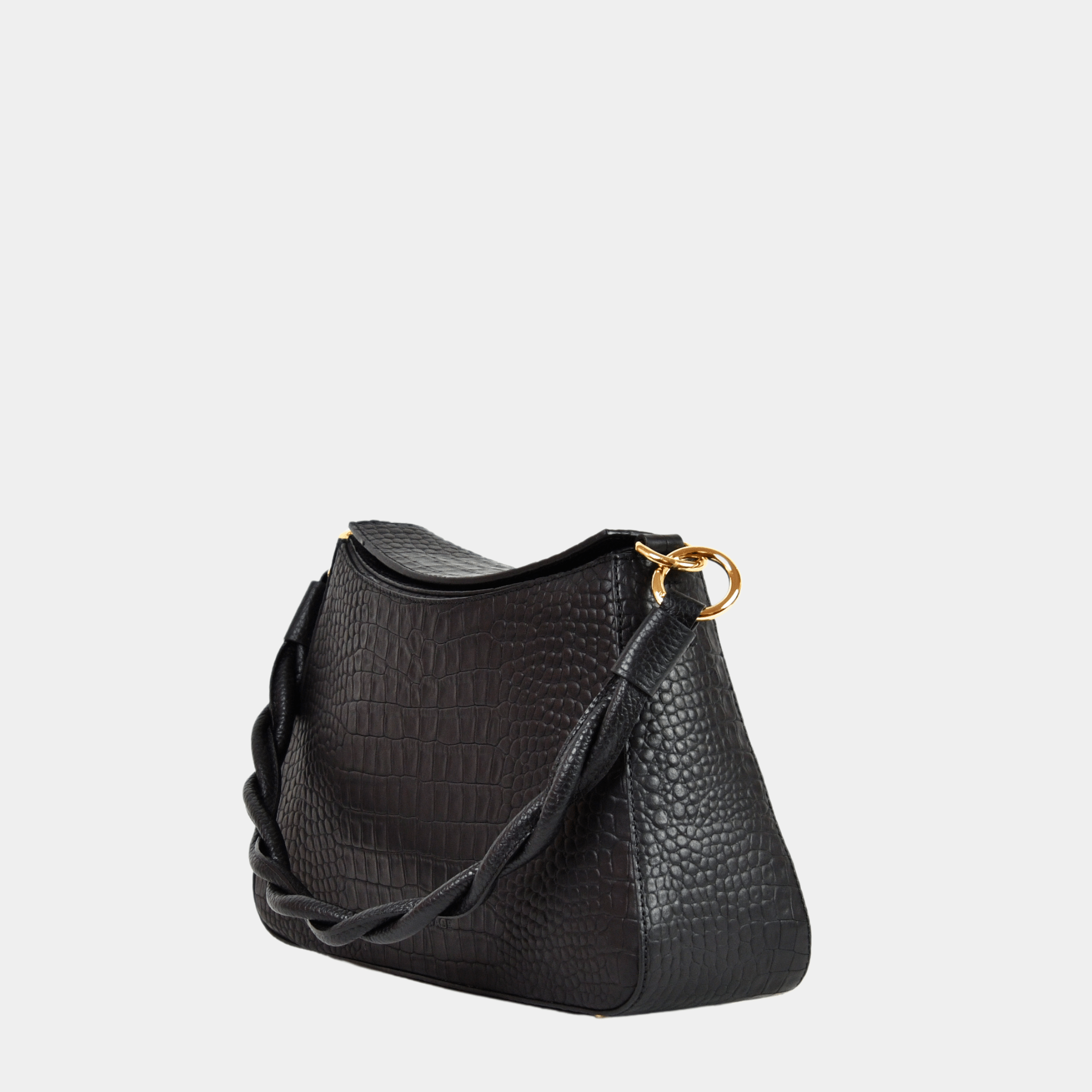 Hippi Grace Paris i fargen coco sort er en liten skinnveske til dame. Vesken kommer med en flettet skulderstropp og en regulerbar crossbody stropp, begge avtagbare. Skuldervesken passer perfekt som både hverdagsveske og festveske. Vesken har en dobbel lukking med magnet knapp i topp. Crossbody vesken har et elegant design, med inspirasjon fra den franske baguette vesken. Norsk design. Svart Skinnveske dame. Svart veske i skinn. Festveske dame. Baguette bag i ekte skinn. Sort Veske. Veske Svart [wv]