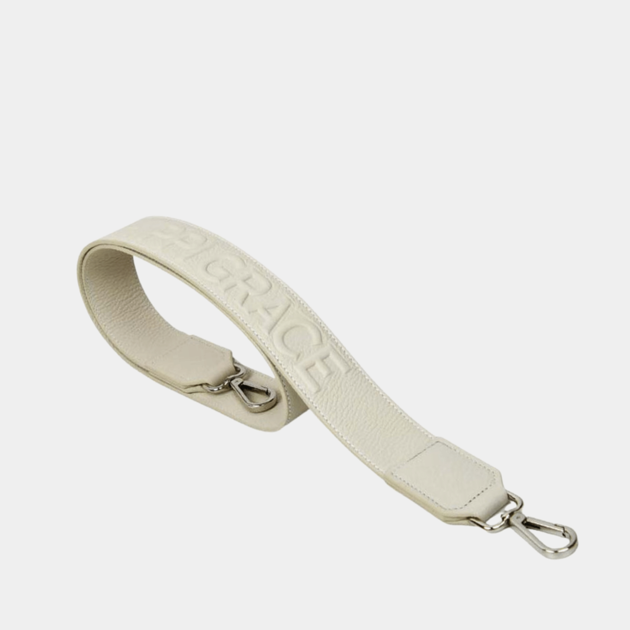 Bred skulderstropp i klassisk Ku-skinn, Crossbody lengde, Preget Logo. Hippi Grace Preget Stropp i Klassisk Offwhite. Ekte skinn. Skinnstropp til veske i ekte skinn. Norsk Design.