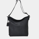 Romslig Crossbody veske fra Hippi Grace. Jobbveske dame. Skoleveske dame. Reiseveske dame. Hverdagsveske dame. PC veske dame. Svart veske til dame i ekte skinn. Bag. Skinn Vekse. PC-veske dame. Norsk Design. Romslig veske i ekte skinn til dame. Hippi Grace Veske Amsterdam i fargen Nobuck Sort . Svart skinnveske til dame. Romslig skoleveske, glidelås-lukning og lang skulderreim. Svart Skinnveske til dame.